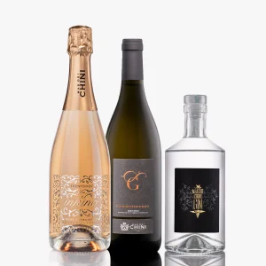 Box degustazione della cantina Mas dei Chini che comprende: Trentodoc Inkino Rosè Millesimato, Gewürztraminer Millesimato e London Gin