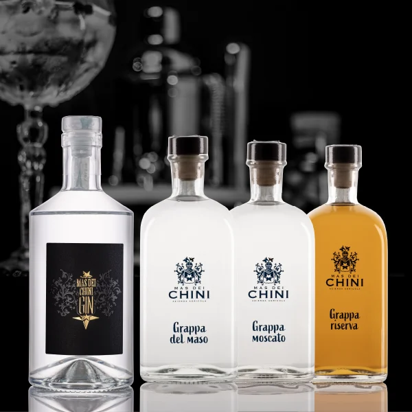 Box degustazione Gran Selezione distillati Cantina Mas dei Chini Trento. London GIN, Grappa del Maso, Grappa Moscato e Grappa Riserva